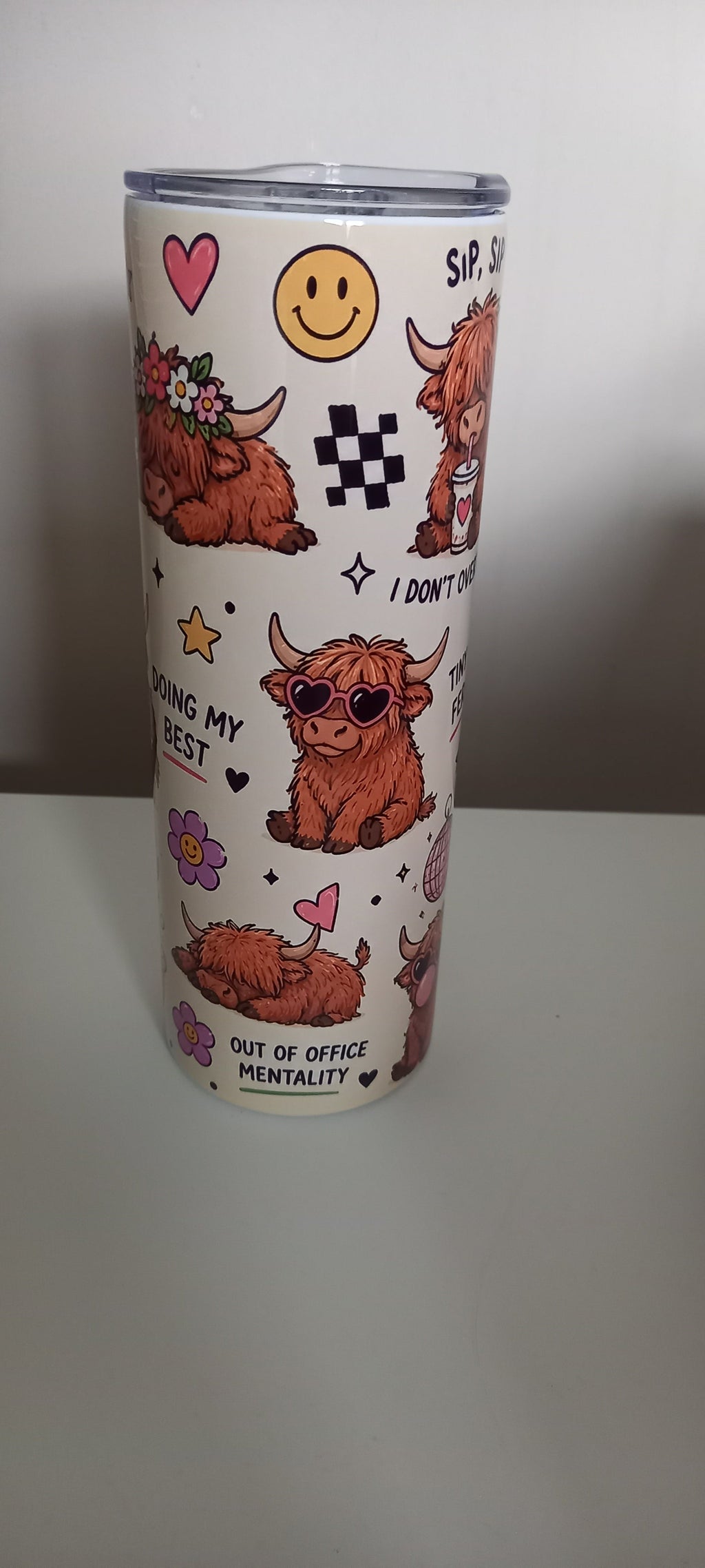 Highland cow tumbler side view showing Mood, Zero Rush Club and Good Food text