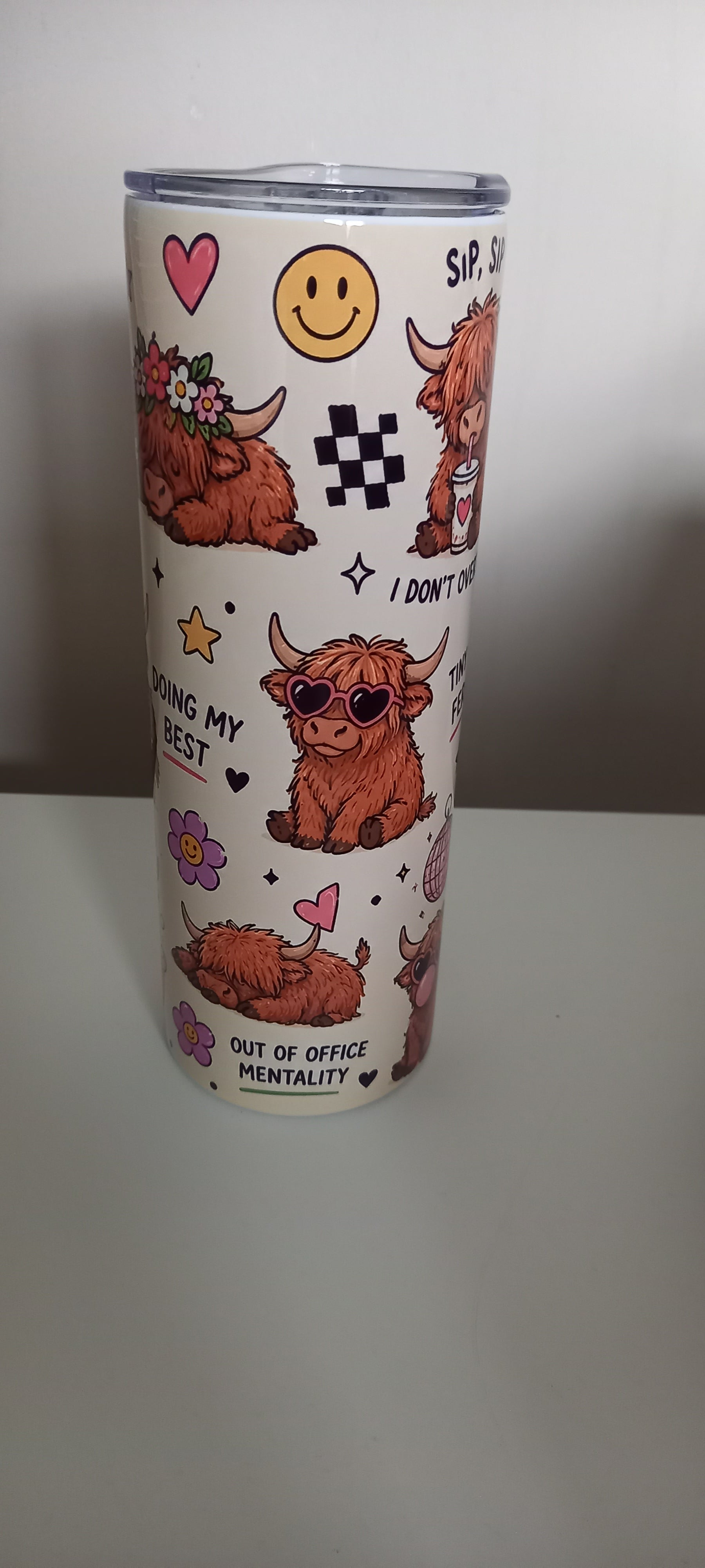 Highland cow tumbler side view showing Mood, Zero Rush Club and Good Food text