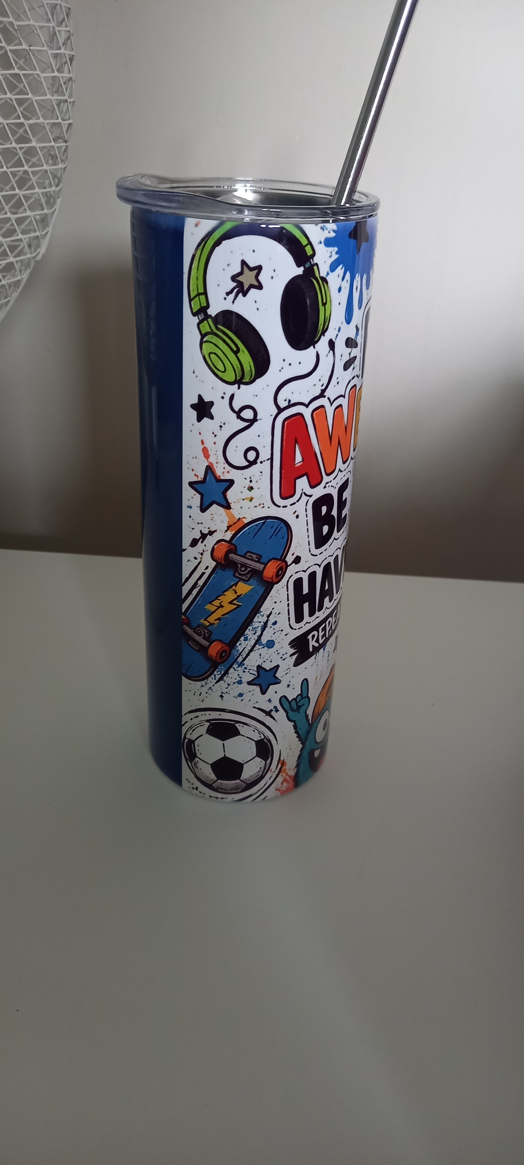 Be Awesome Be Kind Have Fun tumbler side view showing gaming controller and rocket
