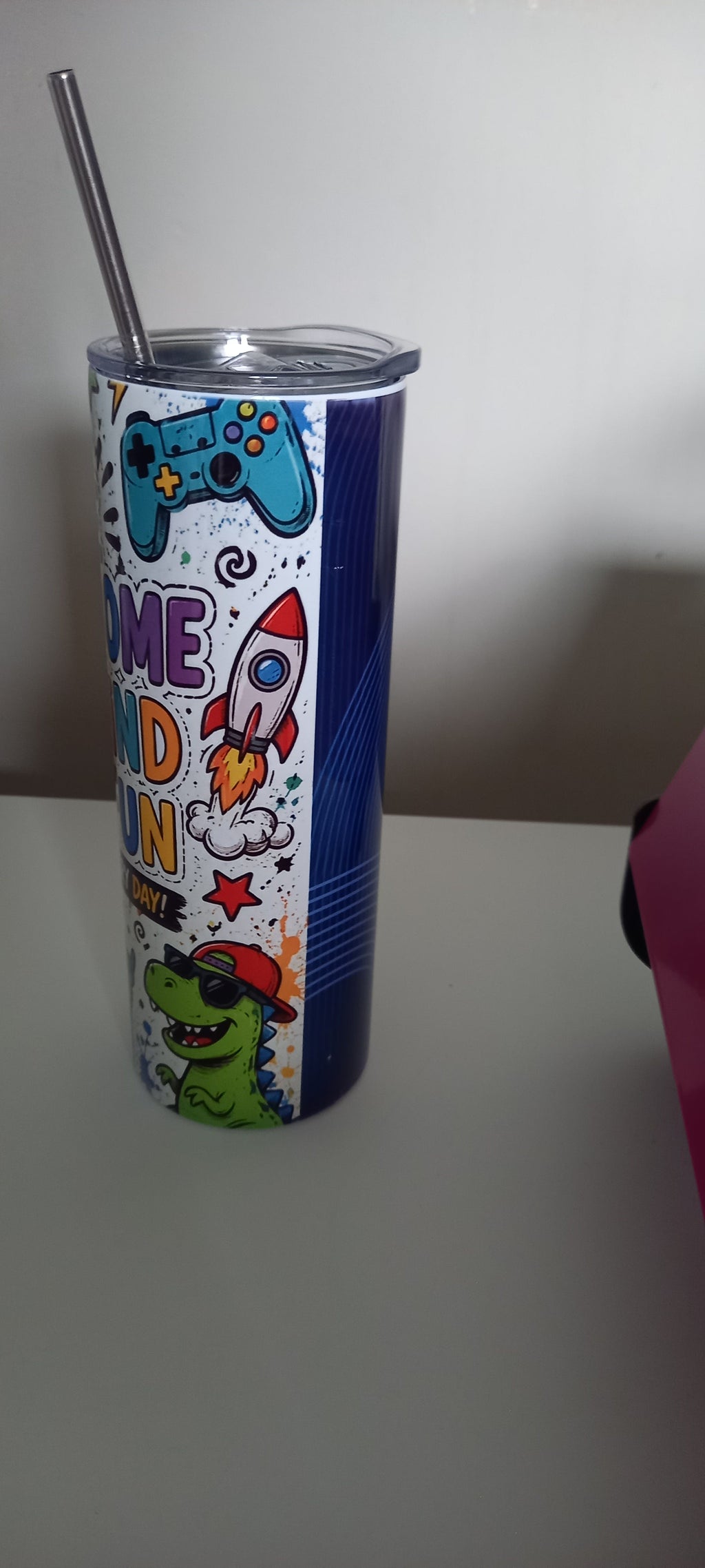 Be Awesome Be Kind Have Fun tumbler side view showing headphones and skateboard