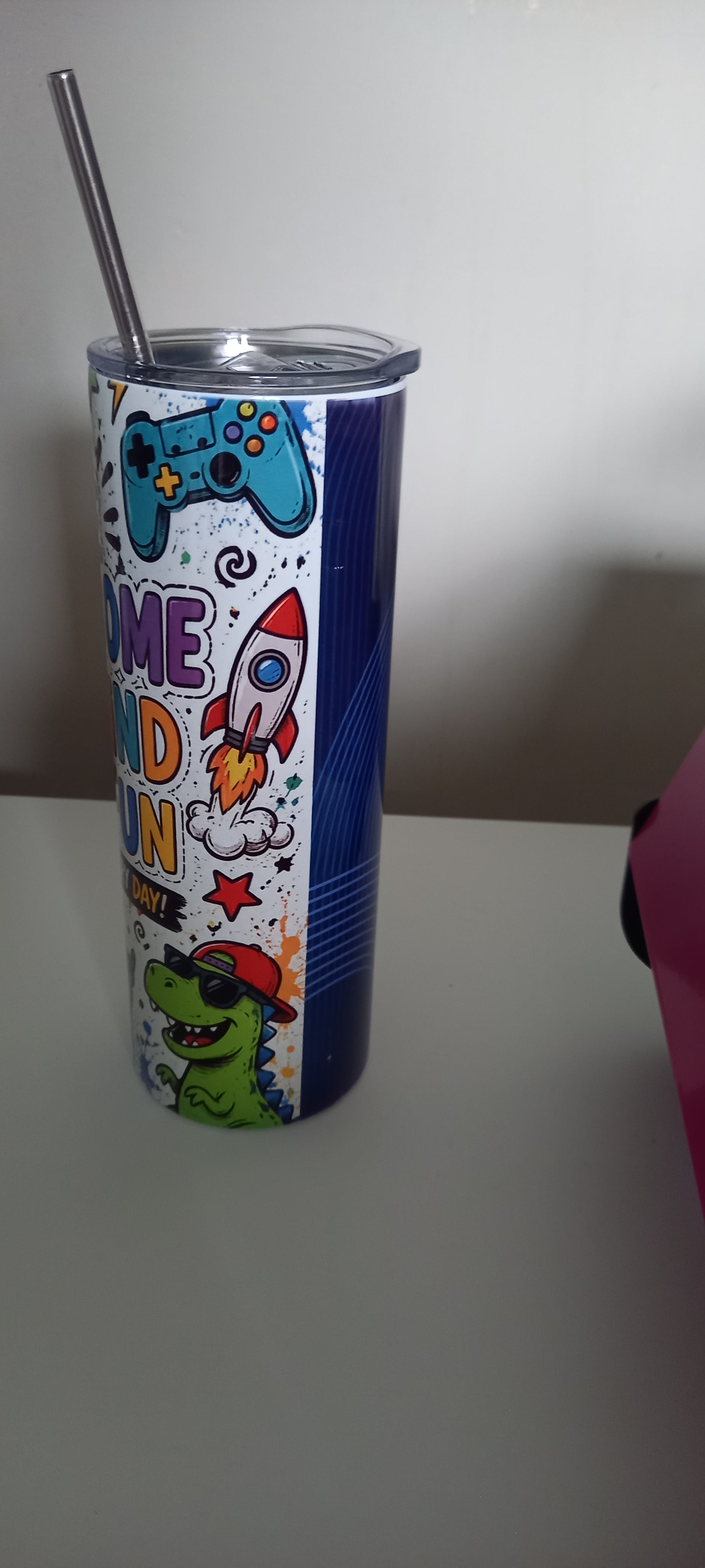 Be Awesome Be Kind Have Fun tumbler side view showing headphones and skateboard