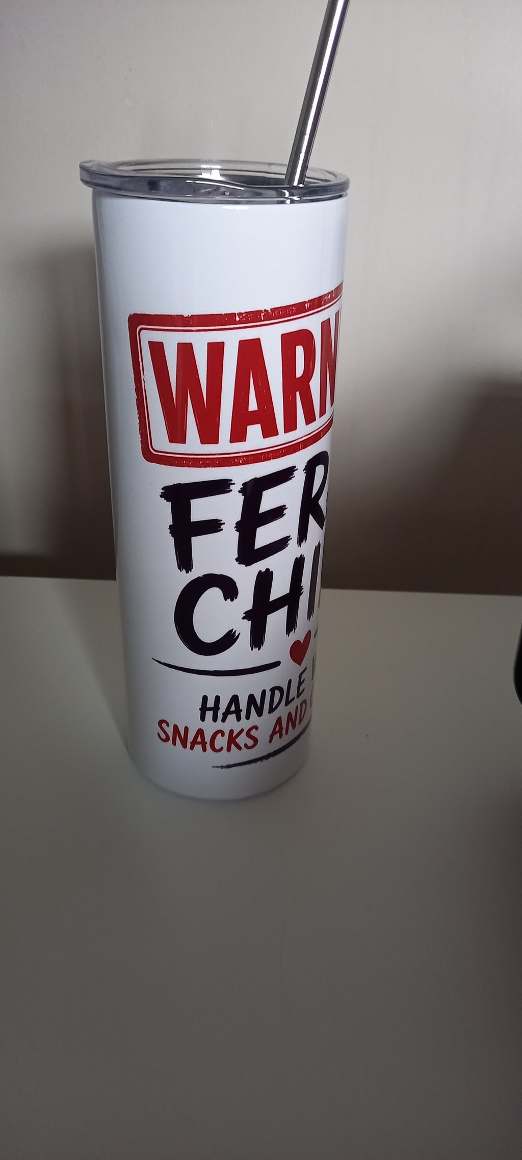 Warning Feral Child tumbler side angle view