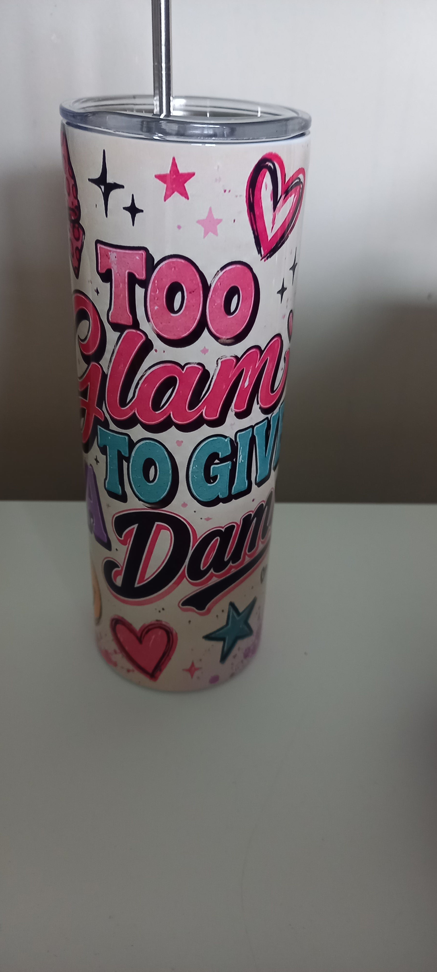 Too Glam to Give a Damn tumbler front view showing leopard bow and Too Glam text