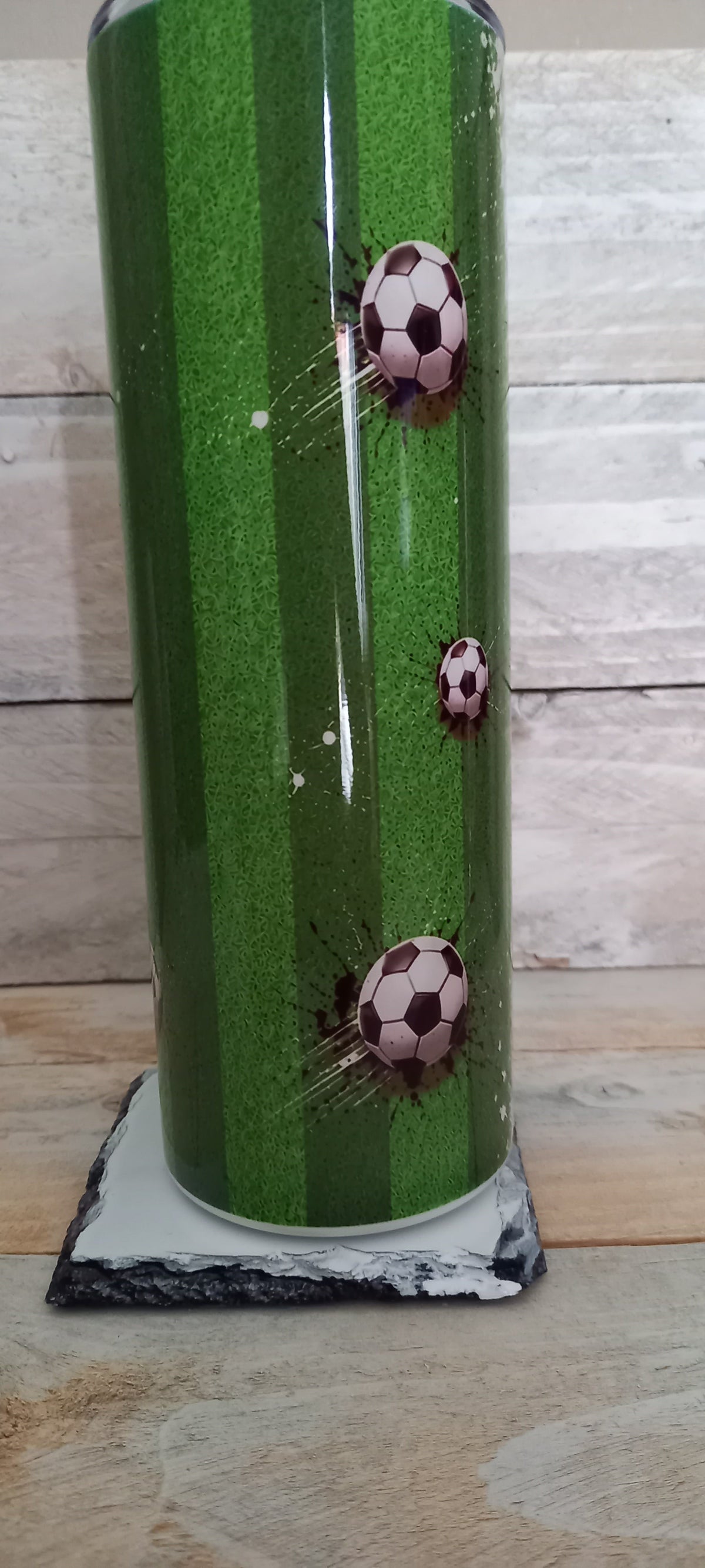 Football tumbler with 3D ball effect, side view