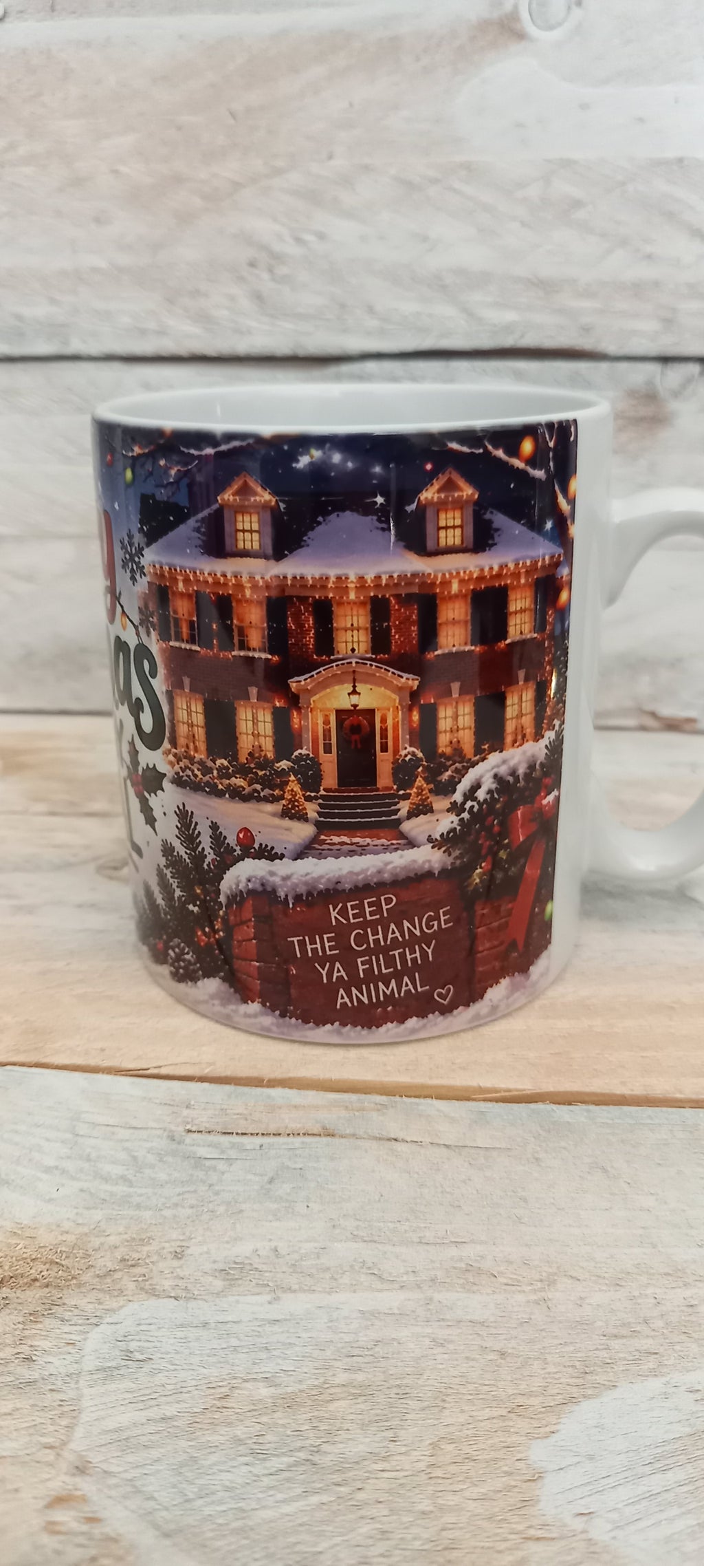 Merry Christmas Ya Filthy Animal Mug - Keep The Change snowy house side