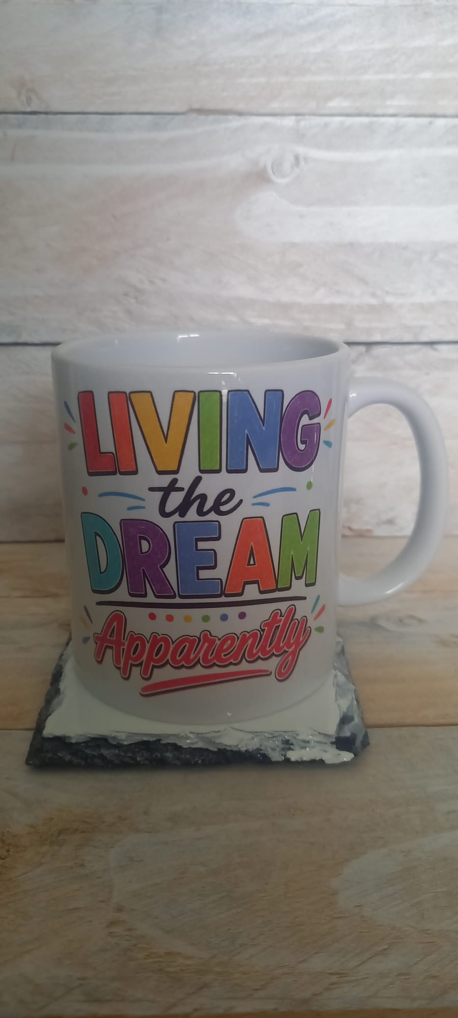 Living the Dream Apparently funny ceramic mug - angled view