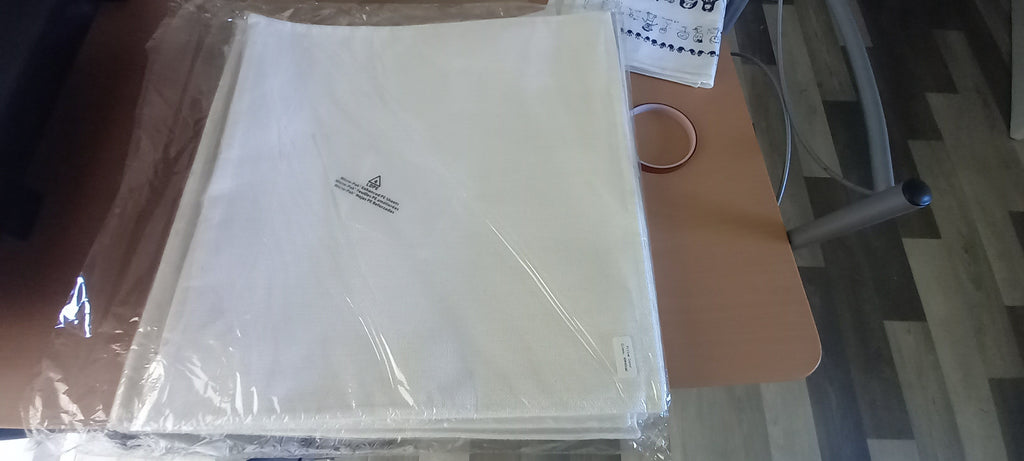 Personalised cushion cover in packaging